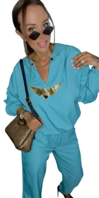 Dres Lola Bianka komplet elegancki turkusowy skrzydła